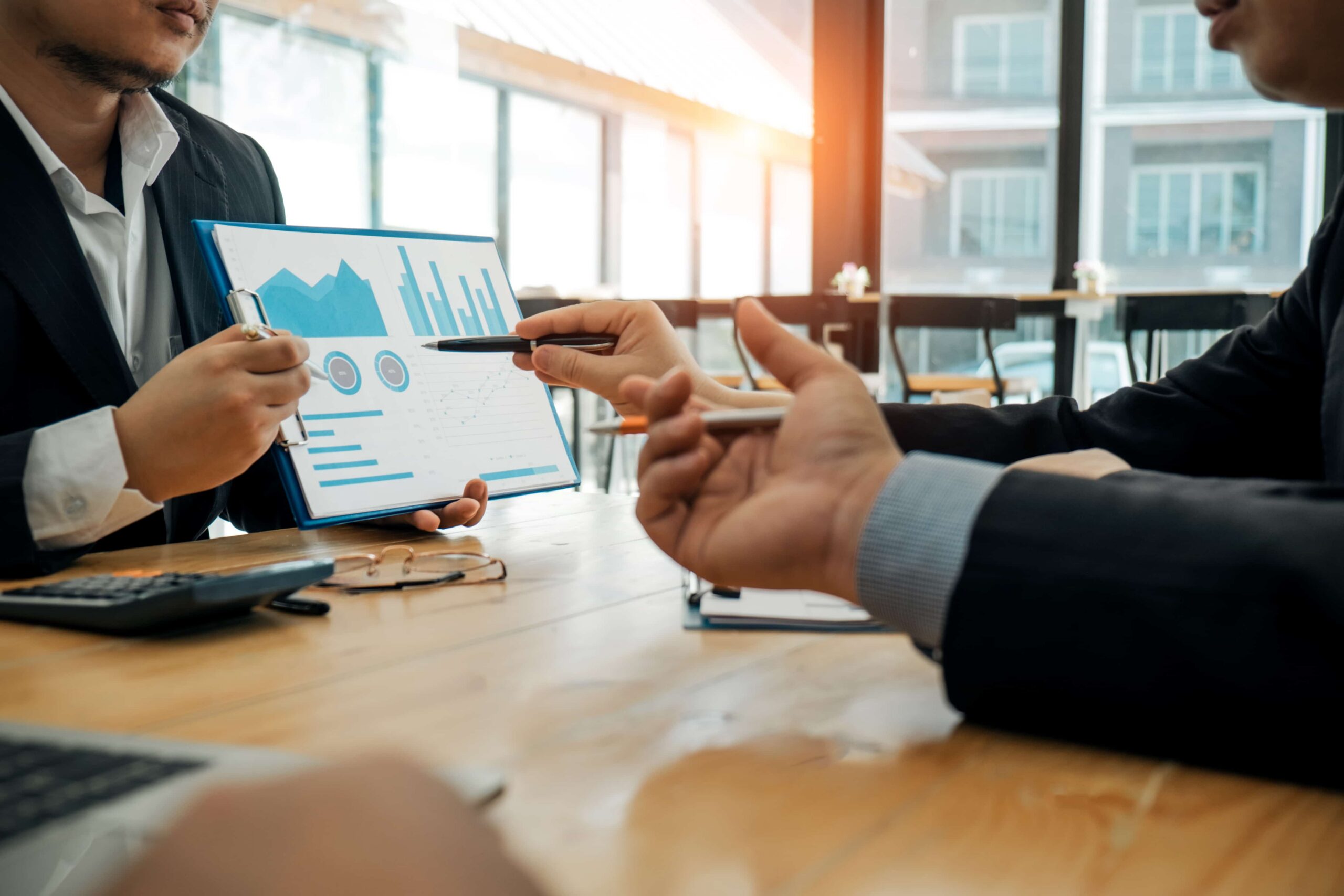 Executives in a meeting defining objectives