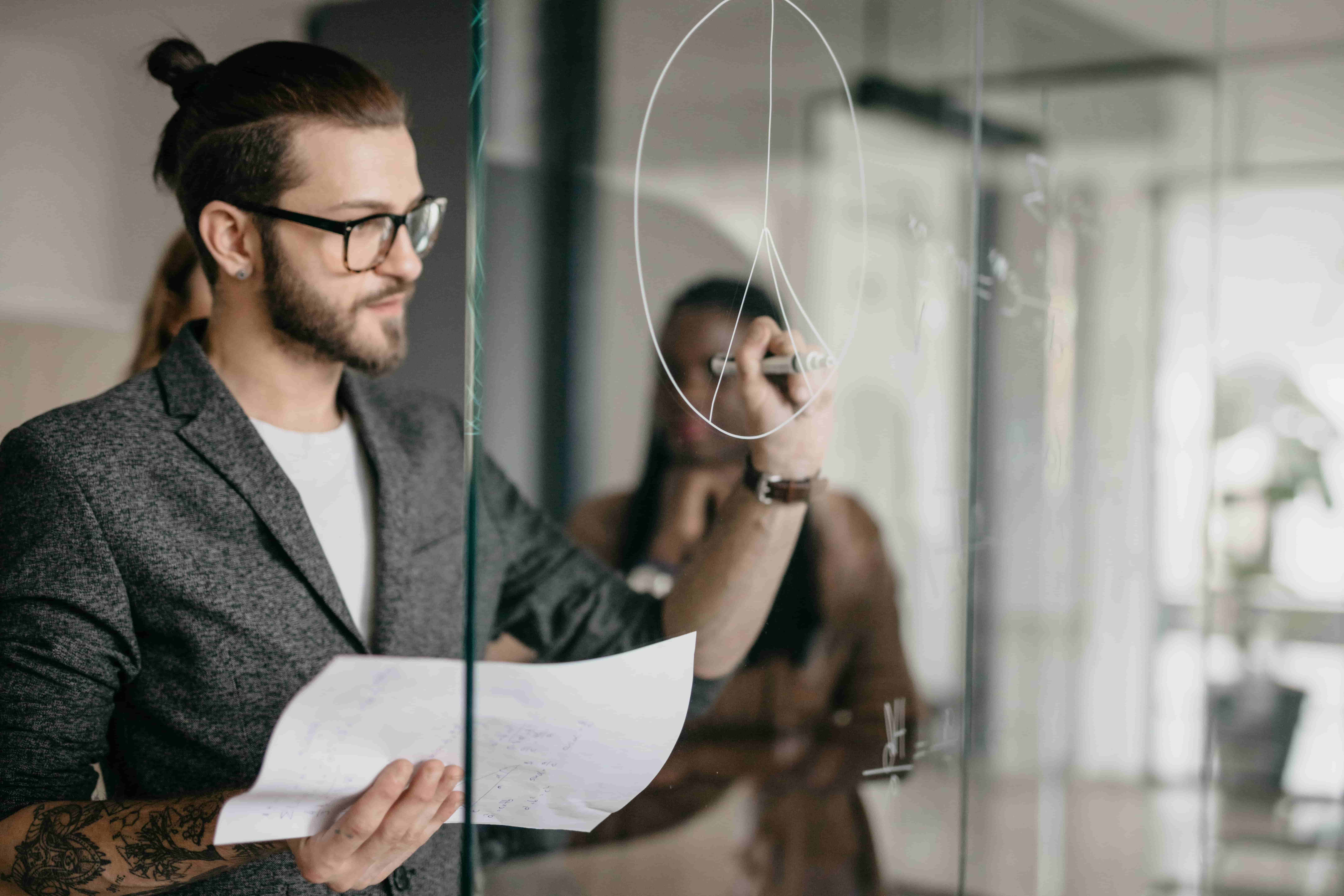 Utility architect designing hybrid network infrastructure integrating fiber, Private LTE, 5G, satellite and edge computing