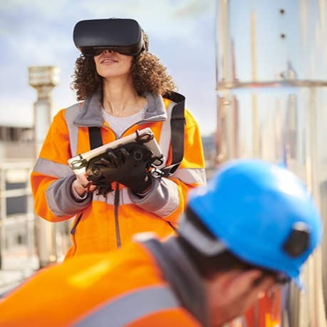 Field technician using virtual reality for industrial digital twin inspection
